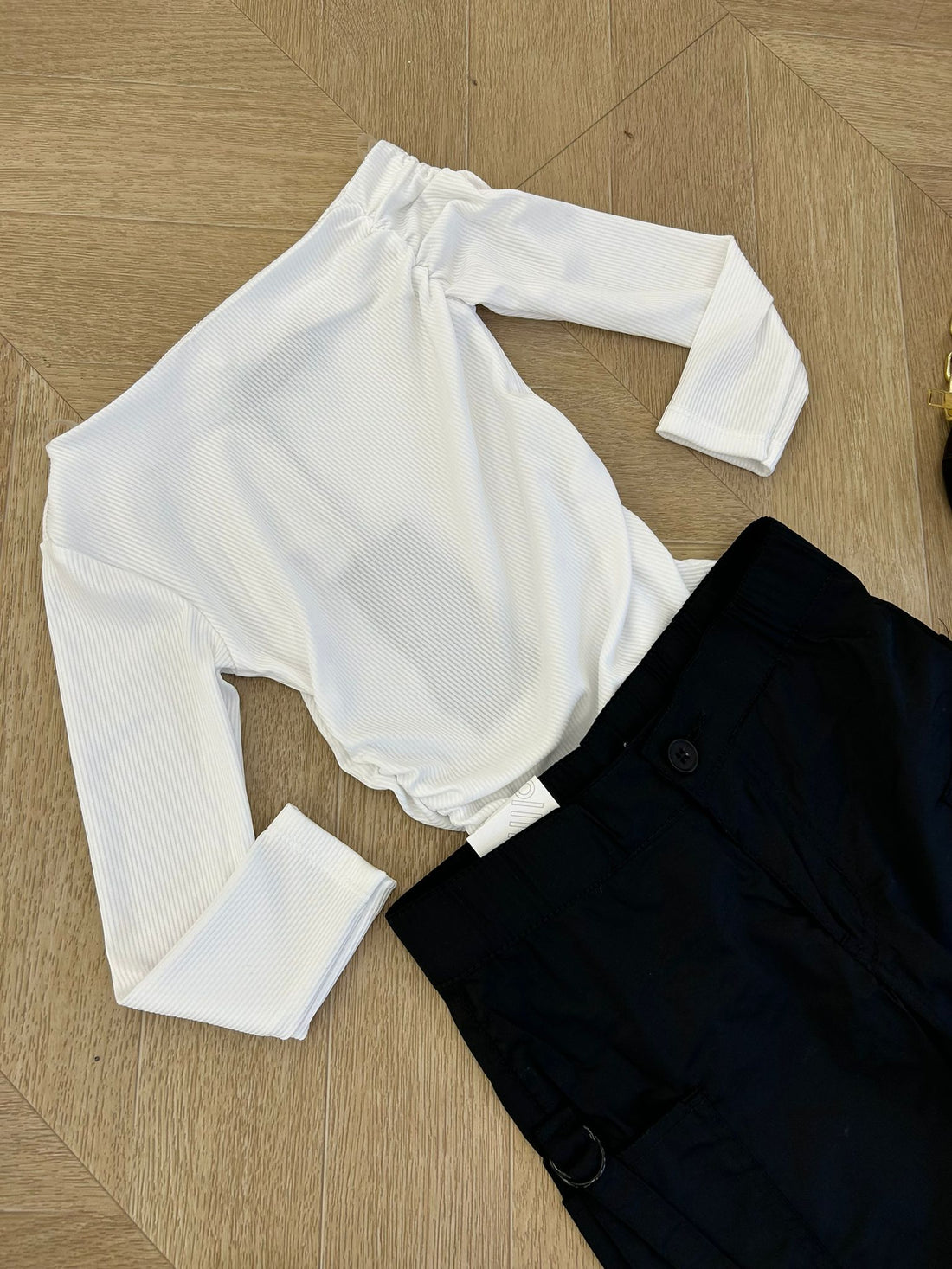 maglia monospalla bianca