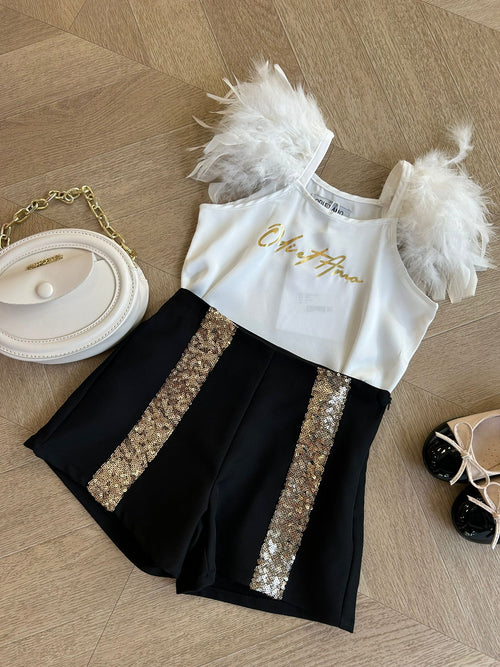 Top con piume