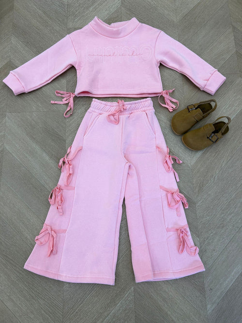 tuta fiocchi rosa