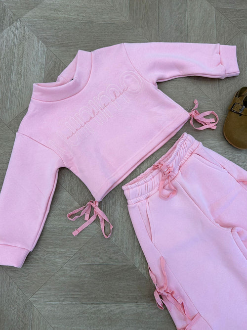 tuta fiocchi rosa