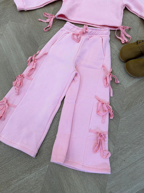 tuta fiocchi rosa