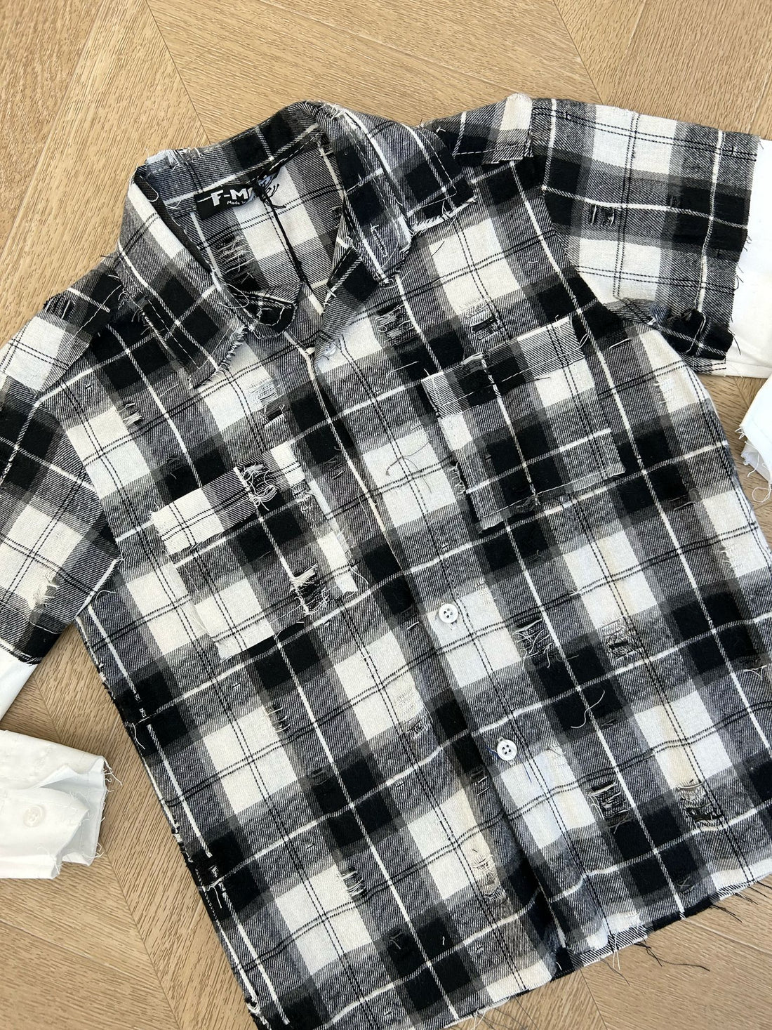 camicia nera quadri